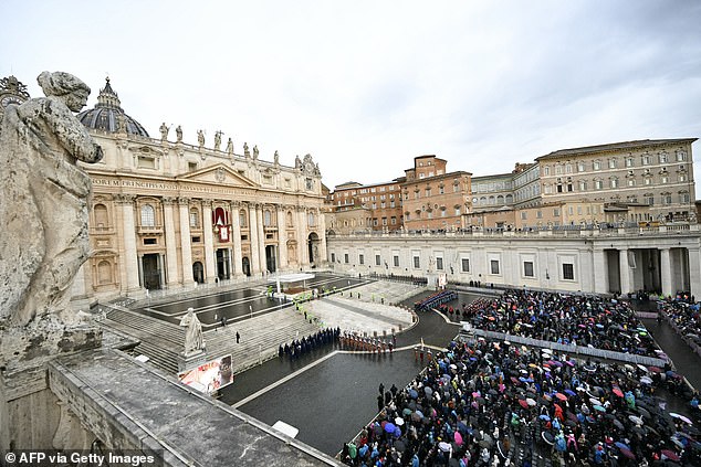 Faithful wait in front of St. Peter's basilica before the Urbi et Orbi blessing of Pope Leo XIV