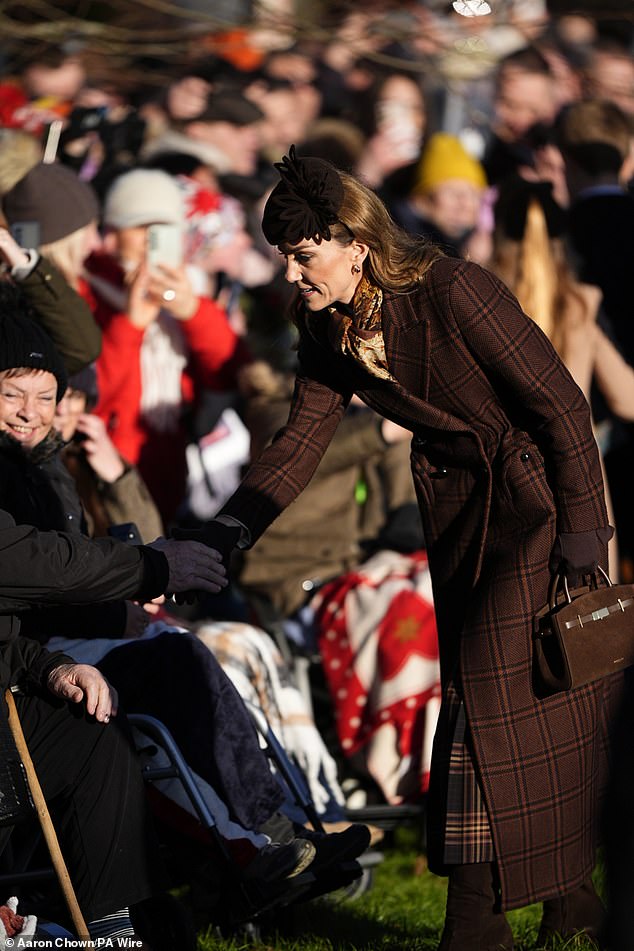 Catherine, who styled her gorgeous bronde tresses in cascading waves, accessorised with her new mocha suede Demellier bag that she debuted during a visit to the Anna Freud Centre in London last month