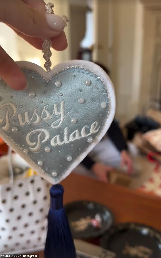 Lily showed off her new Pussy Palace ornament, a reference to one of the songs on her new album and the name she gave to David Harbour's home where she alleges he had affairs