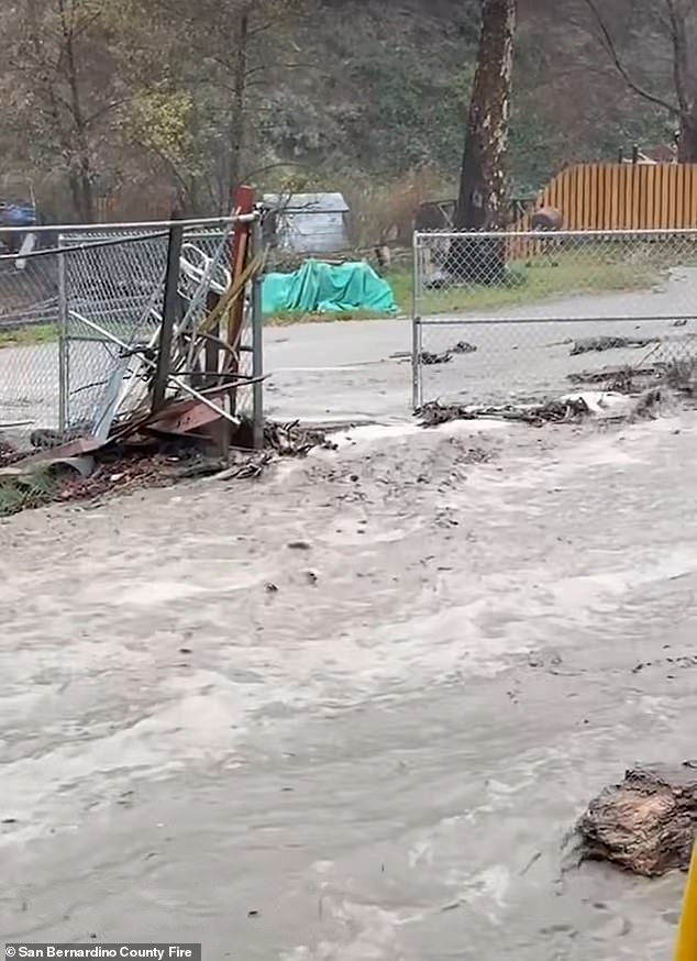 California officials have warned holiday travelers to avoid the roads due to the series of winter storms which are continuing to bring flash flooding and even tornadoes