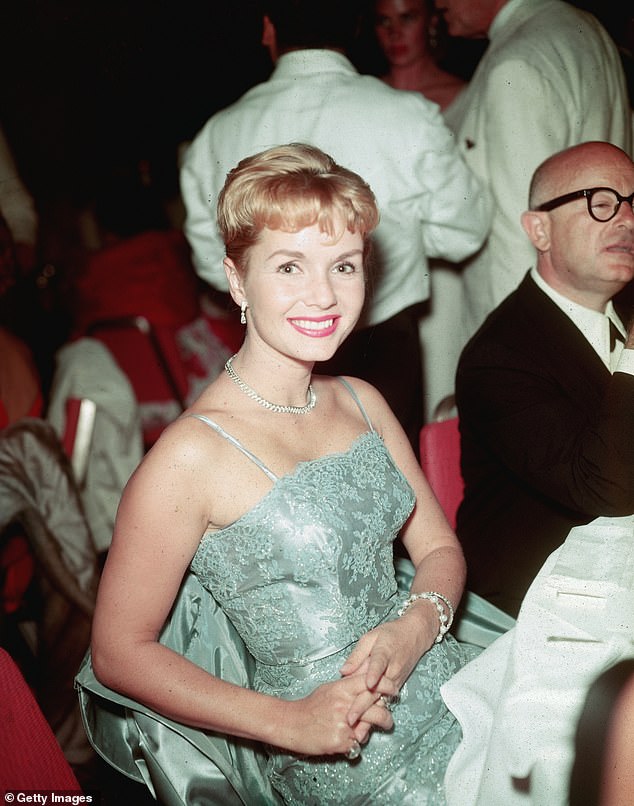 Debbie Reynolds' death came with a cruel symmetry that stunned Hollywood - arriving just one day after the loss of her beloved daughter, Carrie Fisher, as the year drew to a close; seen in 1955