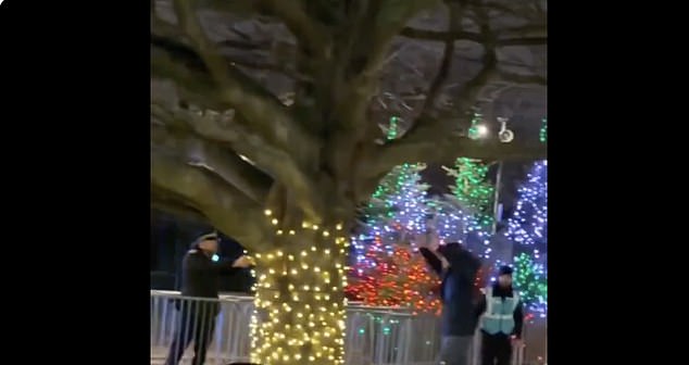 Police arrived with tasers to catch the group and can be heard telling the public to 'go home'