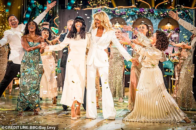 Dressed in festive white and cream outfits, Tess, 56, and Claudia, 53, shared an emotional hug and dance while the celebrity contestants applauded them for their work on the show