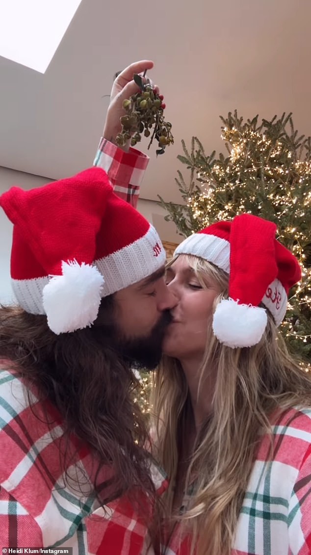 Klum fully embraced the holiday spirit as she packed on the PDA with husband Tom Kaulitz before holding hands during a festive ice-skating date at Rockefeller Center