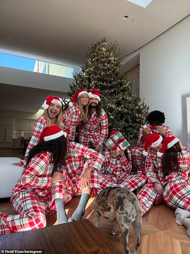 Klum later shared an adorable family photo from the same festive moment, showing her blended brood lounging together in matching holiday pajamas beneath their Christmas tree