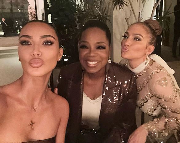 'They¿re whisper-soft, easy to move in, easy to live in¿the kind of set you never want to take off,' Oprah wrote about Kim's Skims pajamas, as she's seen here with Kim (left) and J.Lo (right)