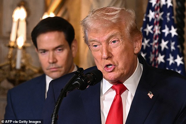 Secretary of State Marco Rubio (pictured with Donald Trump) has accused Mr Ahmed and four other sanctioned individuals of trying to undermine American free speech