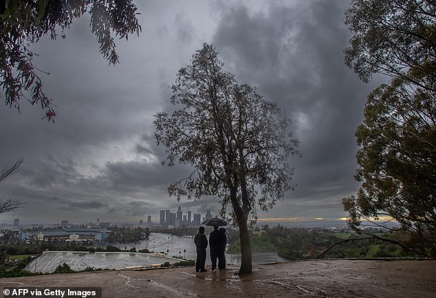 Storm clouds are seen gathering over Elysian Park in Los Angeles, California