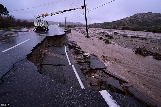 Part of California State Route 138 is seen washed away from flooding outside of Wrightwood