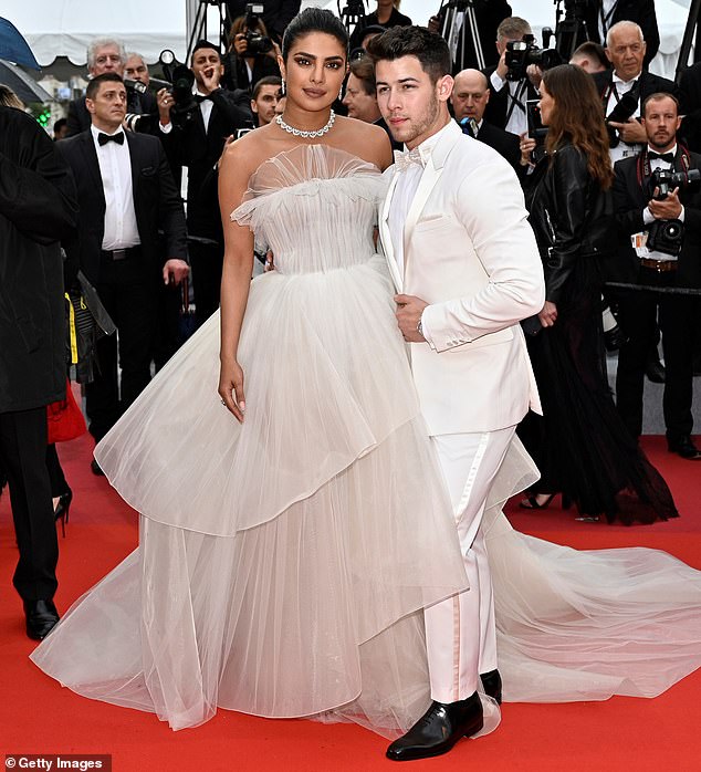 Nick Jonas and wife Priyanka Chopra tied the knot in 2018 - and have made fashion statements on the red carpet on more than one occasion, such as at the Cannes Film Festival in 2019 (seen above)