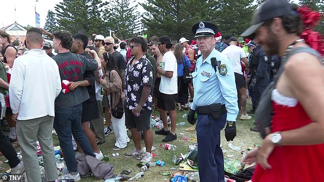 Police were seen keeping an eye on the celebrations at the iconic Sydney beach