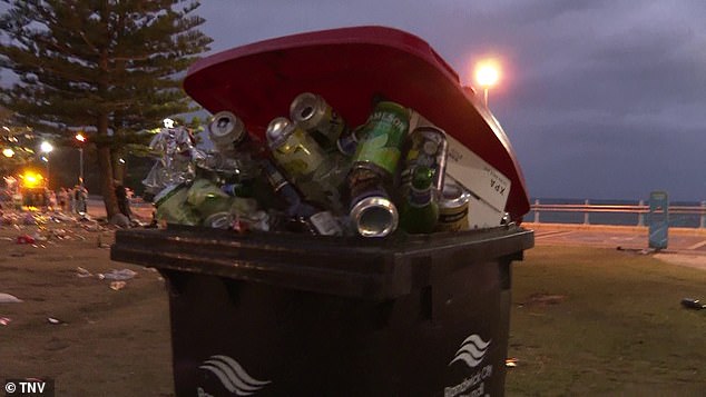 Bins were overflowing with rubbish as the sun began to set at Coogee Beach