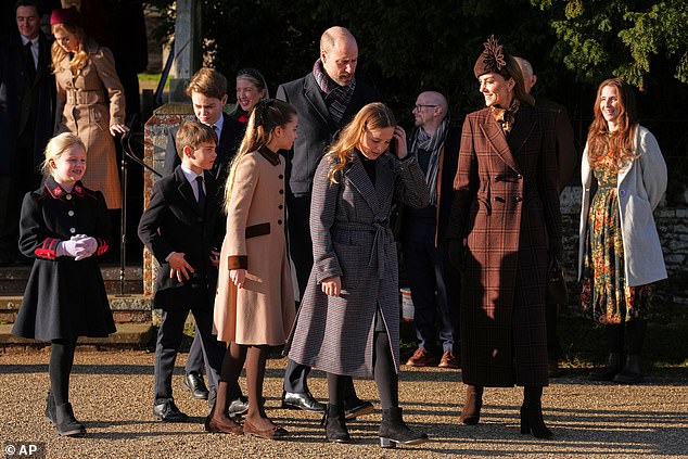 The crowds seemed particularly delighted to see the Wales family (pictured, accompanied by Zara Tindall's daughters Lena, left, and Mia, centre) who were out in force