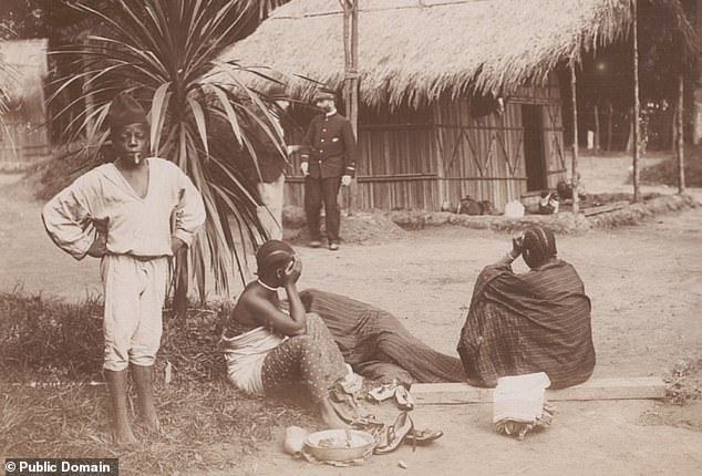 Inside a mock Congolese village set up at the Brussels International Exposition in 1897