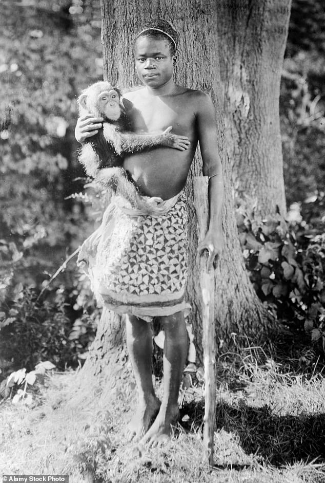 Ota Benga, a Congolese man, is shown, right, in New York's Bronx Zoo in 1906