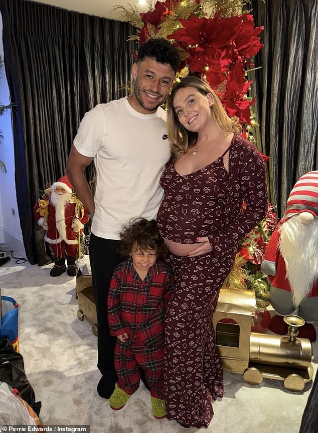 The Little Mix star said she feels 'content and blessed' after spending a festive day in her pyjamas with her fiancé Alex Oxlade-Chamberlain and son Axel, four