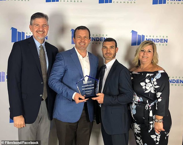 Graham (second from left) became the CEO in 2015, and hired back some of those that were laid off during the rough times