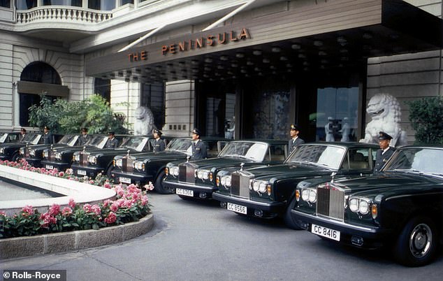 The Rolls-Royce Silver Shadow was an evergreen model sold by the luxury British car firm from 1965 and 1980 and as such has amassed the highest volume of registrations of all Rollers. Pictured: Silver Shadow IIs parked outside the Peninsula Hotel in Hong Kong
