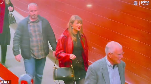 The hitmaker sported a Chiefs' red leather bomber jacket for the festive occasion