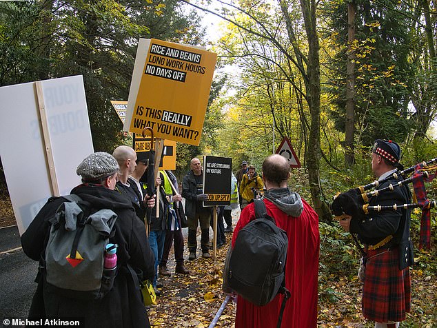 Protesters gather at the Church of Scientology's headquarters in East Grinstead during the org's annual fundraiser