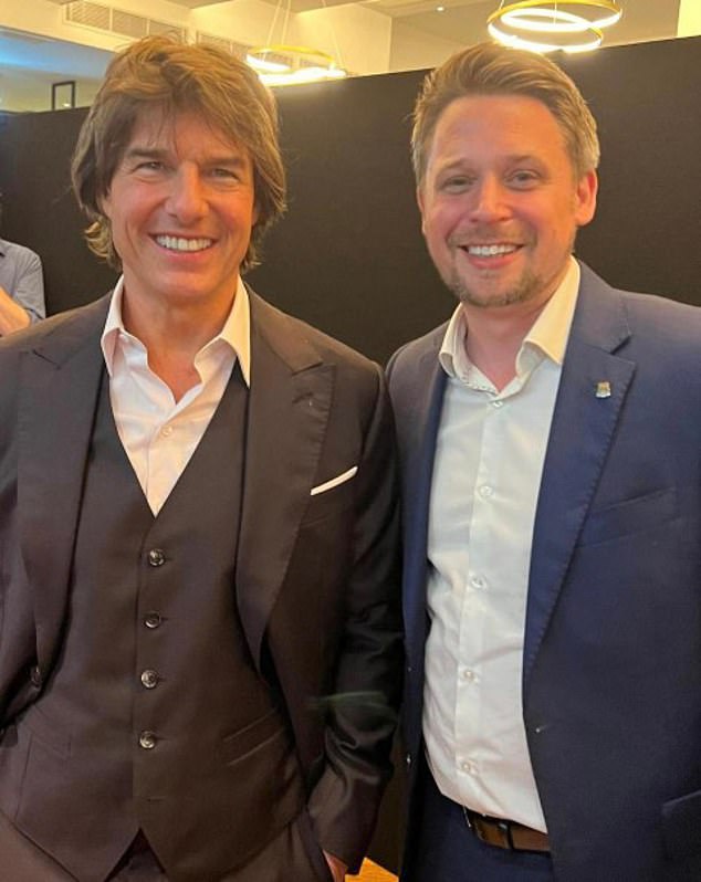 Former mayor of East Grinstead, Frazer Visser, right, met Tom Cruise at the Mission: Impossible premiere in Leicester Square in July 2023