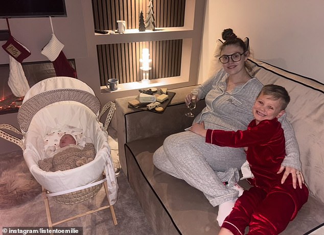 Emilie and Teddy cosy up as they welcome the new addition to their family home