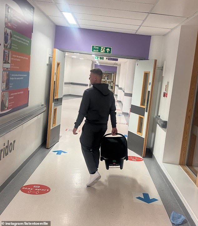 Another sweet image showed Michael carrying Bobby in a baby carrier