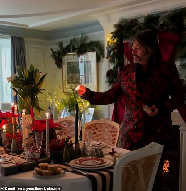 Laurence's table had a centrepiece meticulously assembled from red berries, poinsettias, and lilies, as well as miniature Christmas trees.