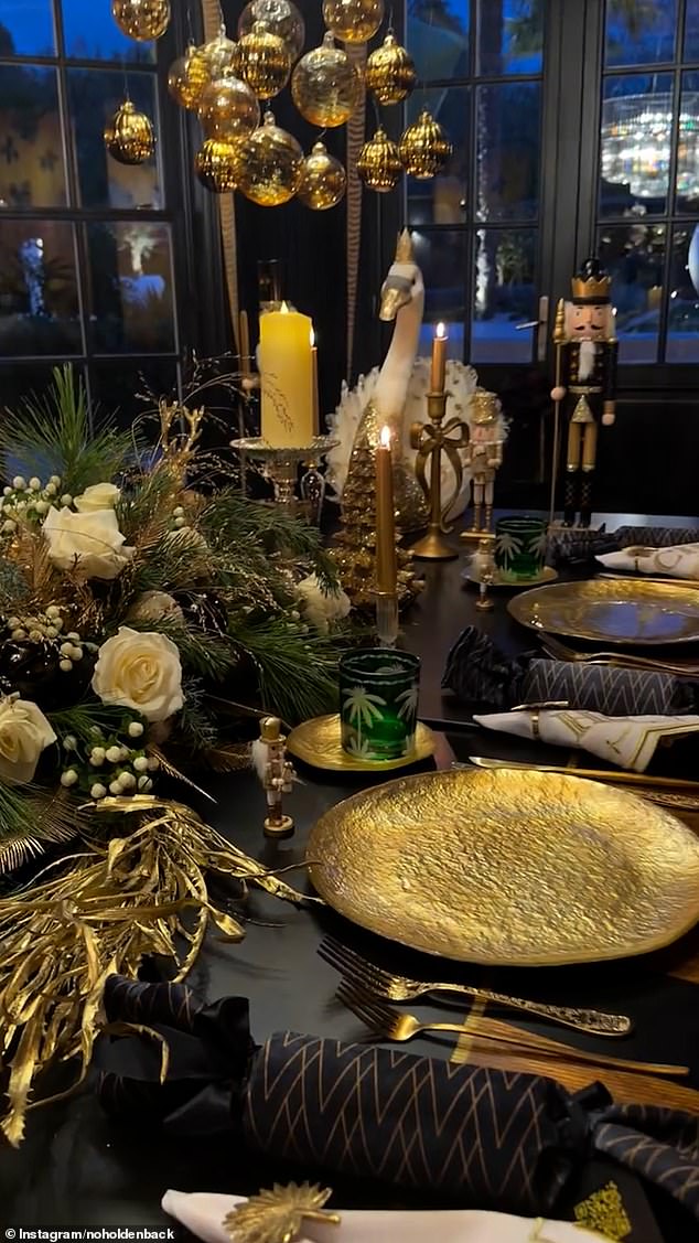 Britain's Got Talent judge Amanda Holden opted for a black-and-gold theme for her Yuletide feast this year