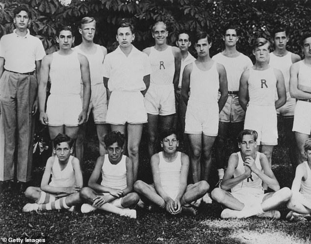 Crown Prince Mohammad Reza Pahlavi of Iran (1919 - 1980, standing, second from left) in sports attire at his boarding school, Institut Le Rosey, in Rolle, Switzerland, circa 1935
