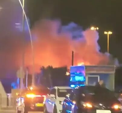 Huge blaze erupts at amusement park in seaside town as residents urged 'close your doors and windows'