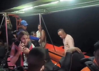 Family of four missing as tourist boat sinks in rough seas after being battered by monster 10ft waves