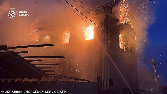 In Vyshgorod, in the wider Kyiv region, rescuers pulled a man from the ruins of a house destroyed in a Russian strike. Pictured: A building damaged during a Russian drone and missile attack in Kyiv,