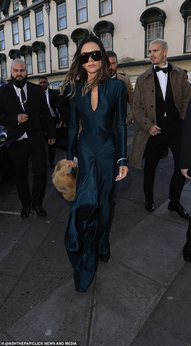 Victoria and David Beckham arrive at Holly Ramsay and Adam Peaty's wedding at Bath Abbey today