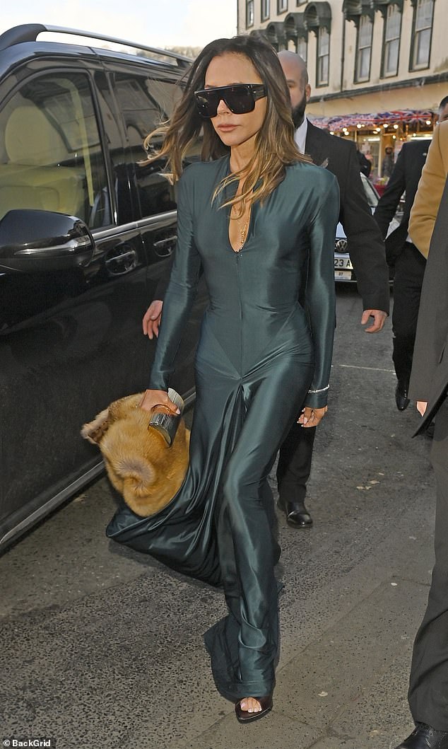 Victoria accessorised with a silver diamond bracelet, oversized black sunglasses, and a silver clutch to carry her essentials