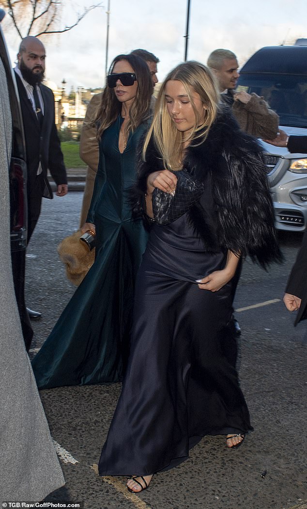 To complete her look, she added inches to her frame with black strappy heels