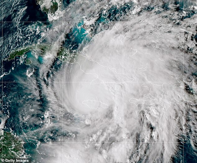 Scientists say that climate change warmed the waters over which Hurricane Melissa (pictured) formed, making the deadly storm four times as likely