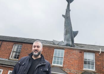 I was BANNED from renting out my house with 25ft shark sticking out the roof but cheeky neighbours can still cash in