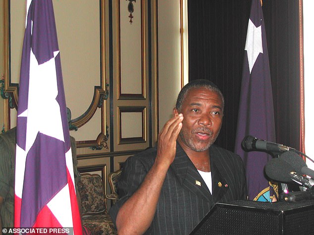 Charles Taylor addressing journalists in 2003. He entered Liberia's political space with the promise of reform and change. What ensued, however, was some of the bloodiest atrocities ever recorded