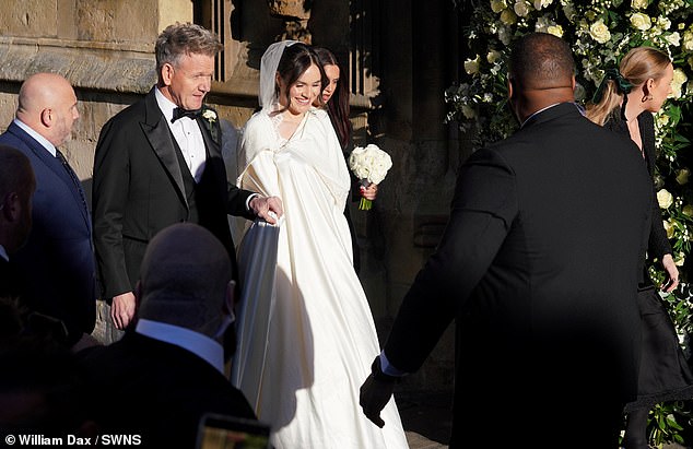 Although the bitter feud rages on, it would have been hard to tell, as Holly glowed earlier in the day while arriving the Abbey, guided by her celebrity chef father, Gordon Ramsay, 59.