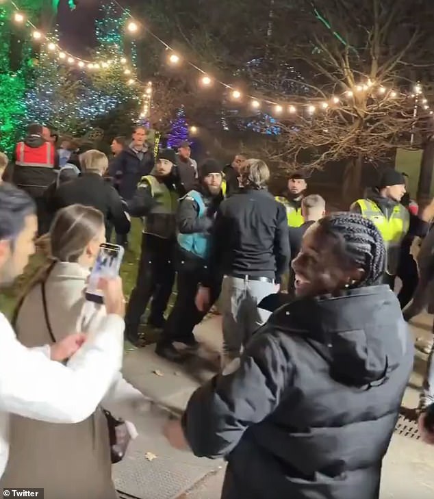 Security are seen attempting to intervene as several men break into fights and revellers are pushed to the floor