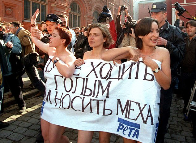 But Ms Vernelli has now turned her back on the campaign entirely, urging people to 'forget Veganuary'. Pictured: Animal rights activits of PETA are arrested by police as they demonstrate naked and only covered with a banner near Red Square