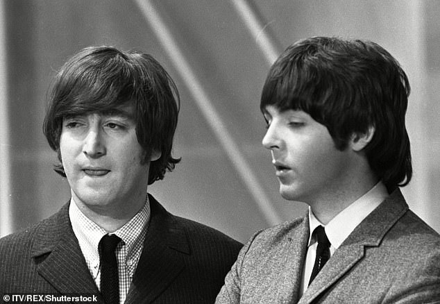 Sir Paul McCartney pictured with fellow Beatle John Lennon in 1965 - the same year he purchased his central London townhouse