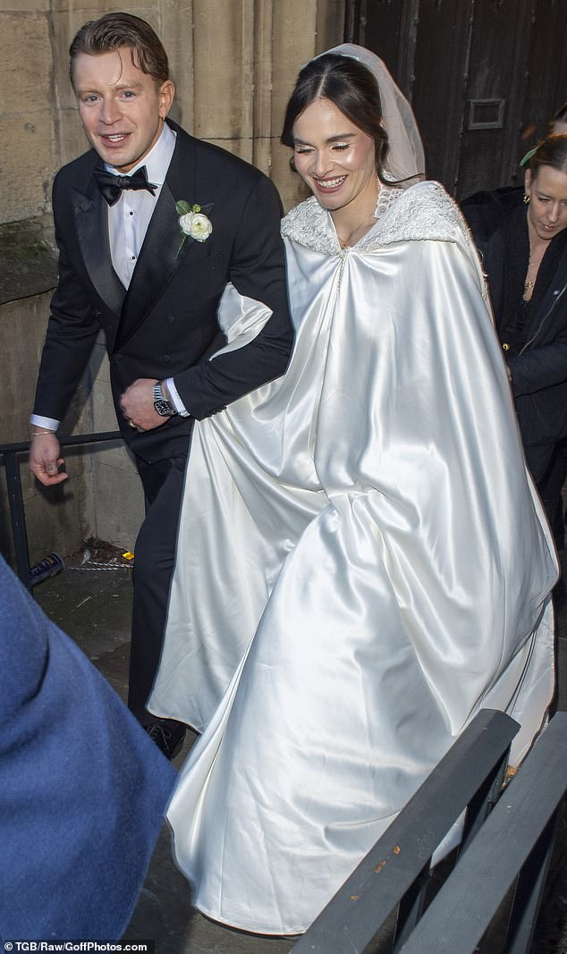 Adam Peaty and Holly Ramsay leaving Bath Abbey after their wedding service yesterday
