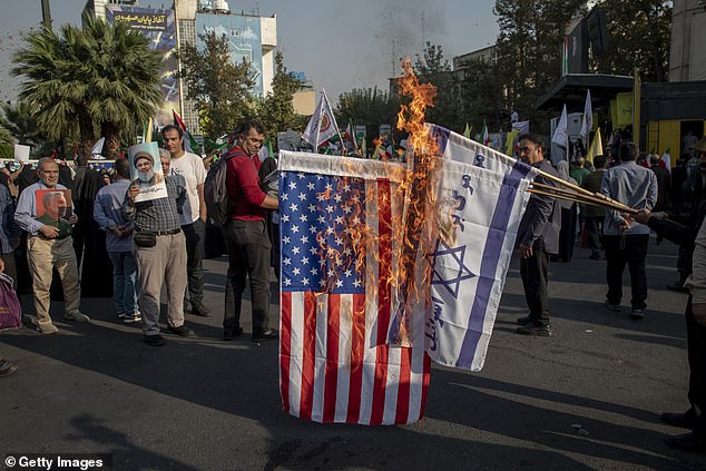 The Iranian president said the nation was in 'total war' with the US, Israel and Europe, saying Iran was 'surrounded from every angle'