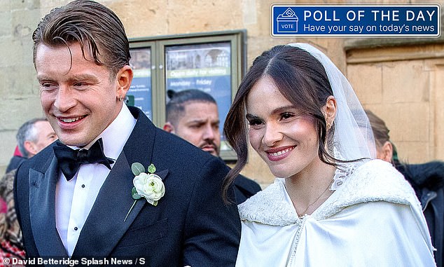 Adam and Holly pictured together after their ceremony