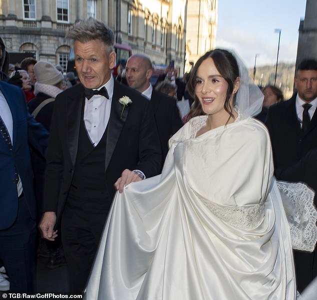 Holly swept into her wedding in Bath Abbey on the arm of her celebrity chef father Gordon