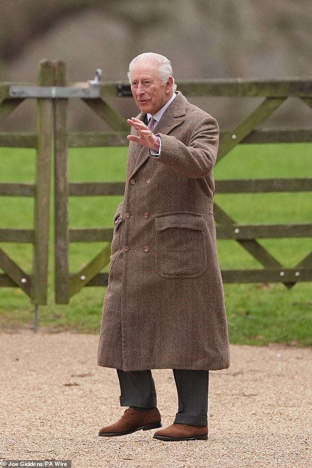 His Majesty, 77, wore wore a long tweed brown coat coupled with black trousers as he waved to the adoring public