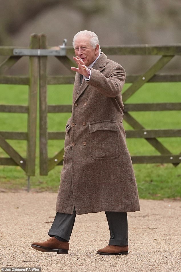 The monarch waves to the crowds at Sandringham, Norfolk this morning