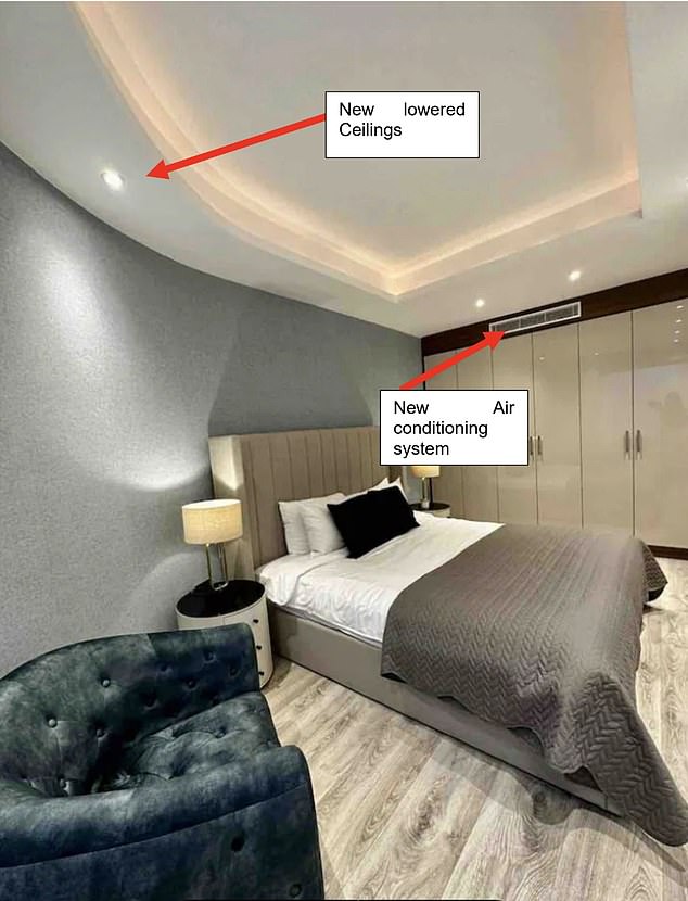 Pictured: One of the bedrooms inside the apartment with its new ceiling and air conditioning unit